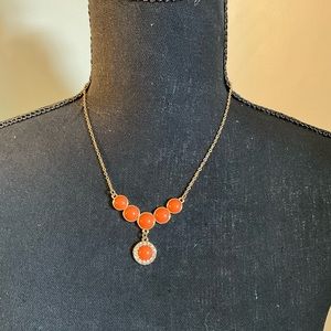 LC Lauren Conrad gold tone with orange center and sim crystal necklace